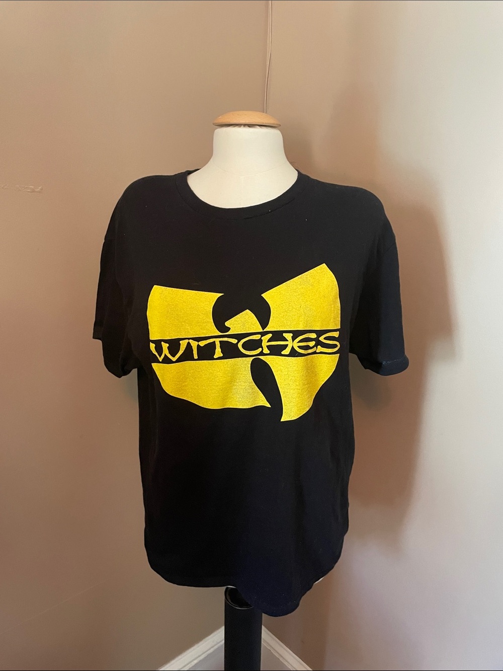 Black Graphic T-Shirt with Yellow 'Witches' Logo size L